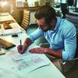 Designer working through options